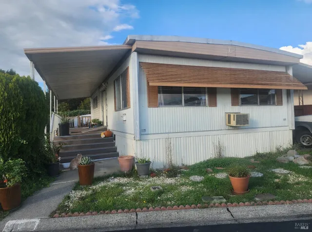 a front view of a house with porch