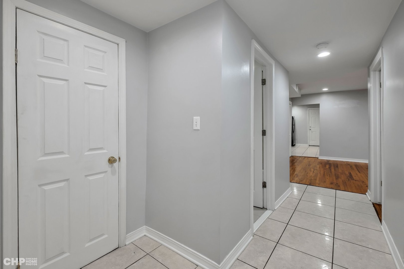 1052 North Springfield Avenue Chicago, IL 60651 - Photo 12 of 31 a bathroom with a sink and a mirror