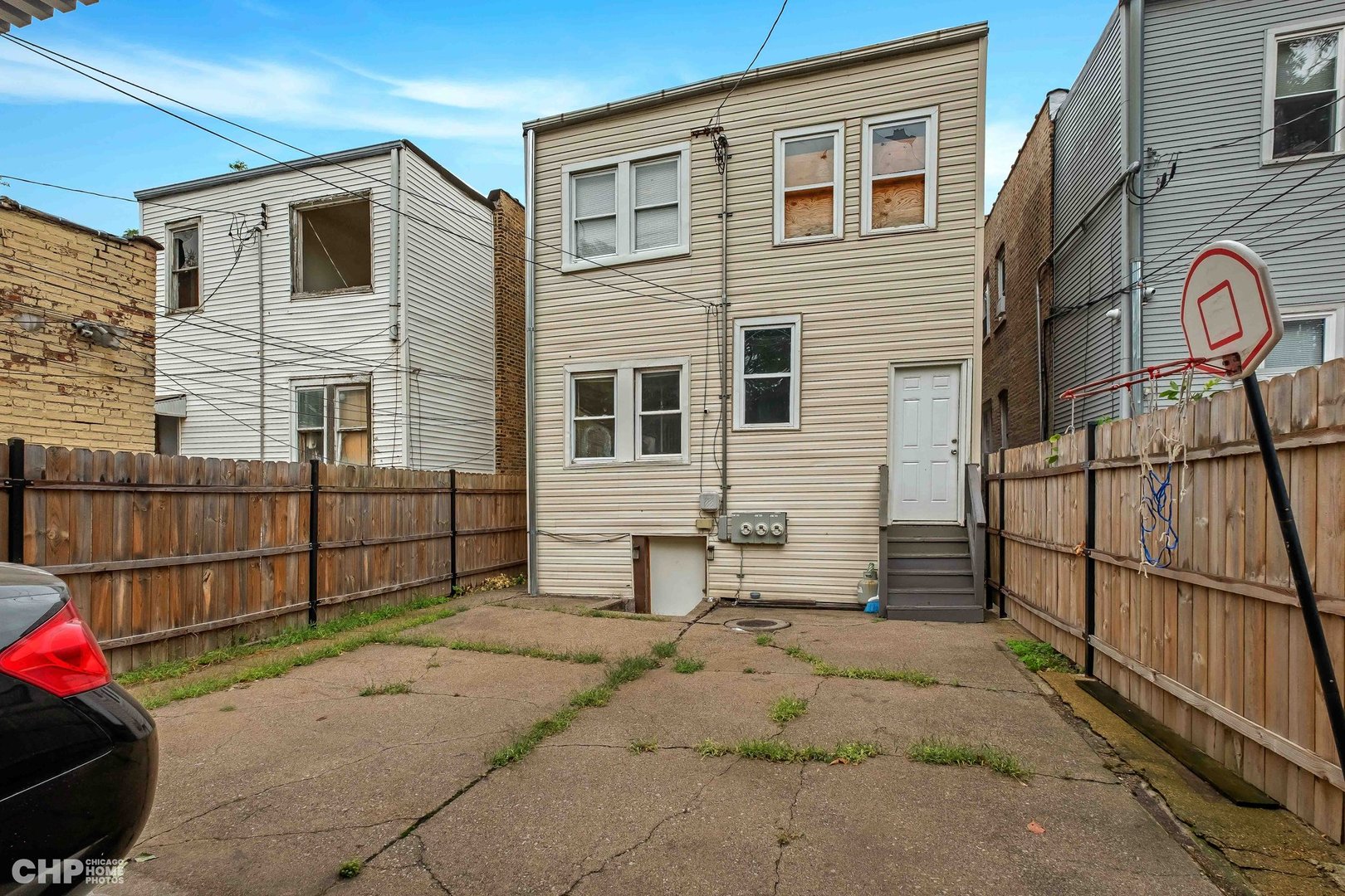 1052 North Springfield Avenue Chicago, IL 60651 - Photo 30 of 31 a front view of a house with a garage