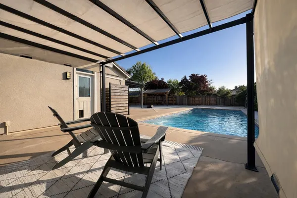 a front view of a house with yard