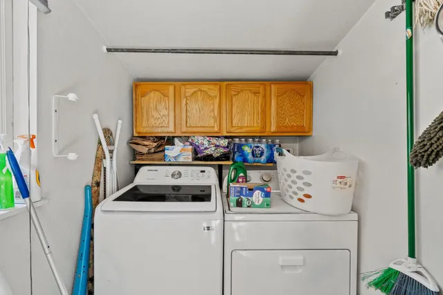 a bathroom with a sink vanity mirror and toilet