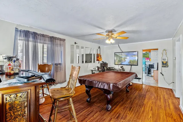 a bed room with a bed and a chandelier