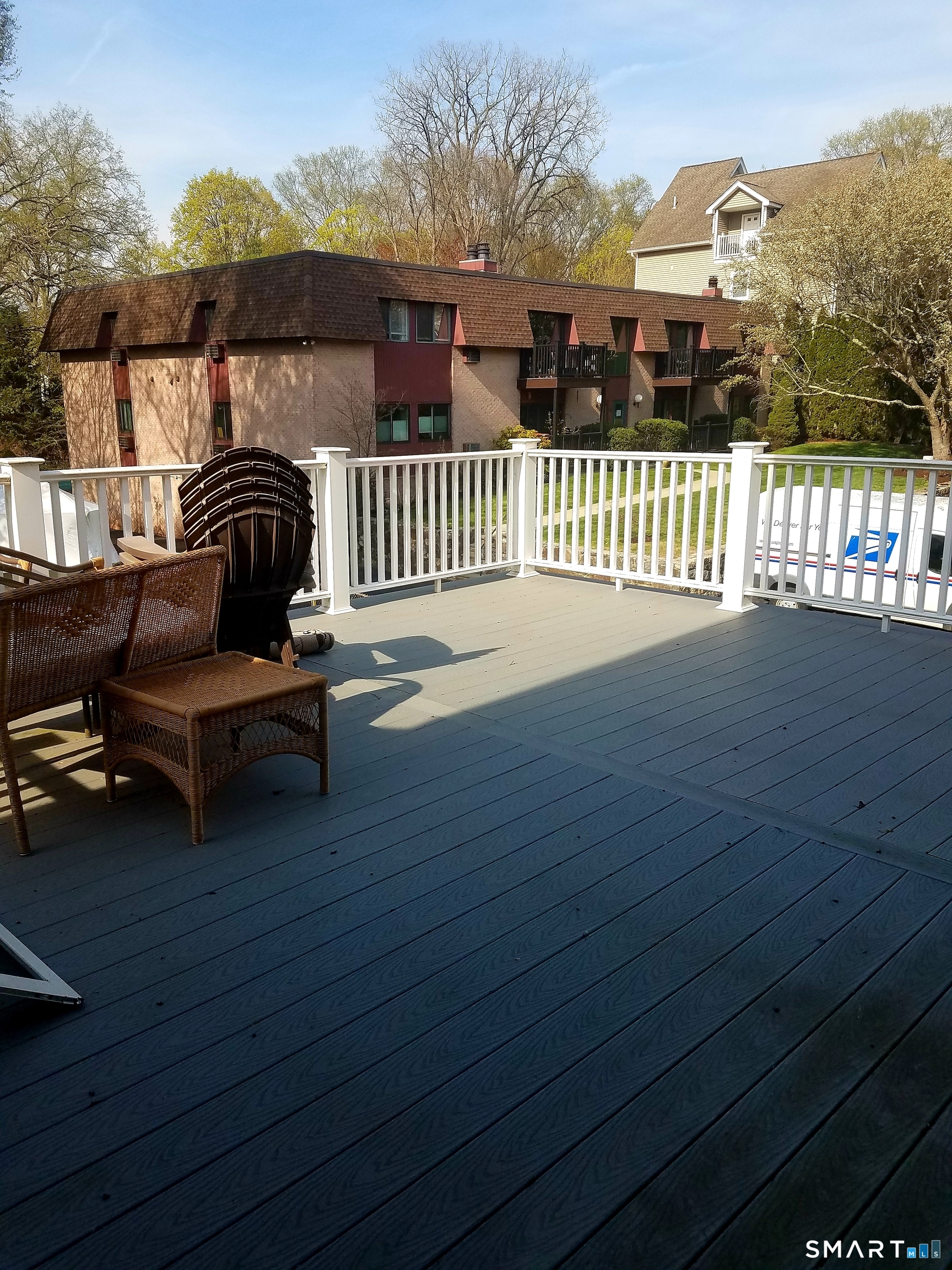72 Maple Tree Avenue, Unit 2 Stamford, CT 06906 - Photo 20 of 25 a view of a porch with furniture