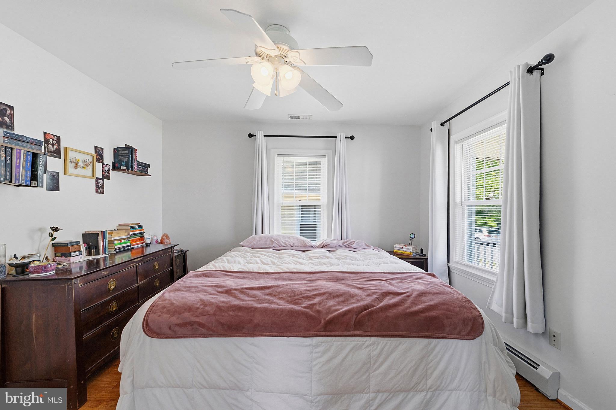 15 South Clinton Avenue Maple Shade, NJ 08052 - Photo 13 of 29 a bedroom with a bed dresser and a window