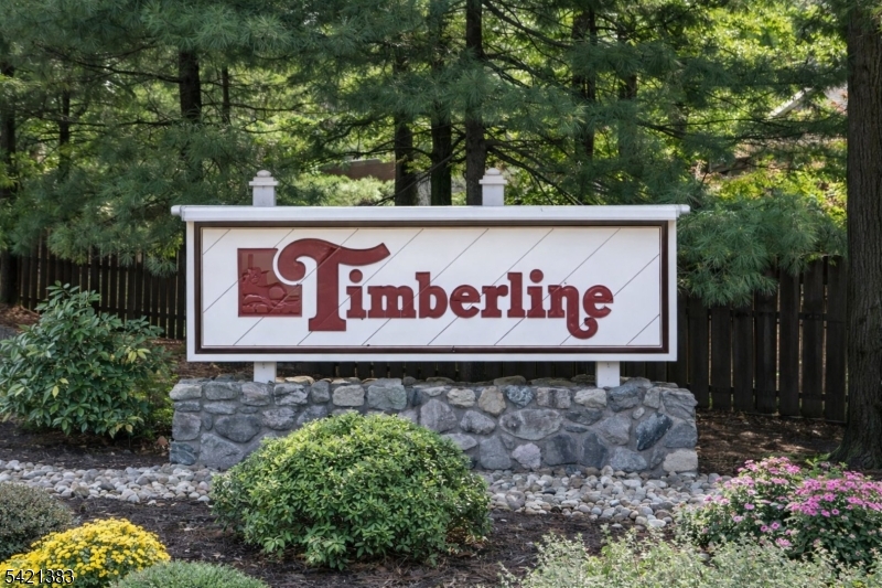 Undisclosed Address Edison, NJ 08820 - Photo 1 of 44 a sign broad in front of a red tree