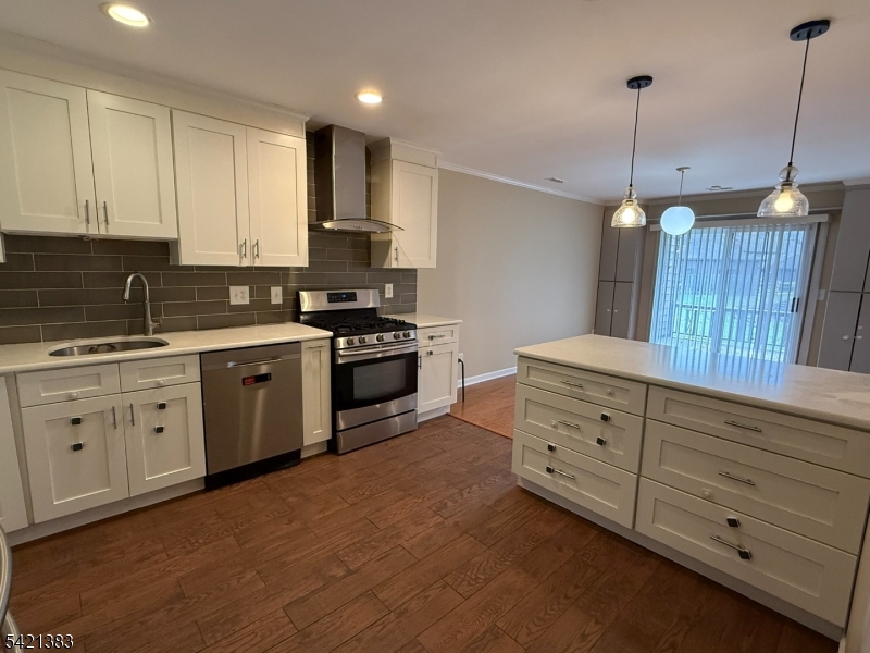 Undisclosed Address Edison, NJ 08820 - Photo 19 of 44 a kitchen with granite countertop a sink stainless steel appliances and cabinets