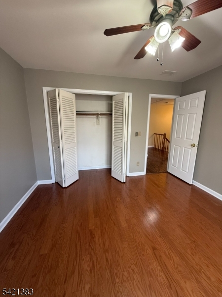 Undisclosed Address Edison, NJ 08820 - Photo 36 of 44 a view of empty room with wooden floor and fan