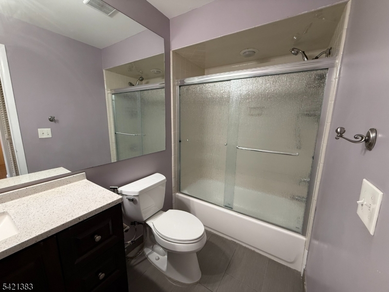 Undisclosed Address Edison, NJ 08820 - Photo 37 of 44 a bathroom with a sink a toilet and shower