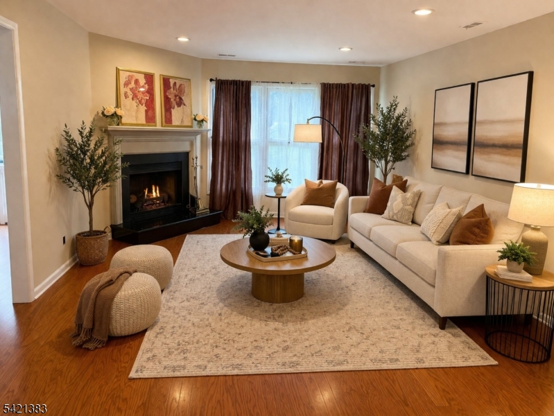 Undisclosed Address Edison, NJ 08820 - Photo 7 of 44 a living room with furniture and a fireplace