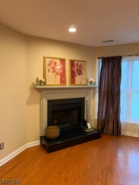 Undisclosed Address Edison, NJ 08820 - Photo 8 of 44 a living room with furniture and a fireplace