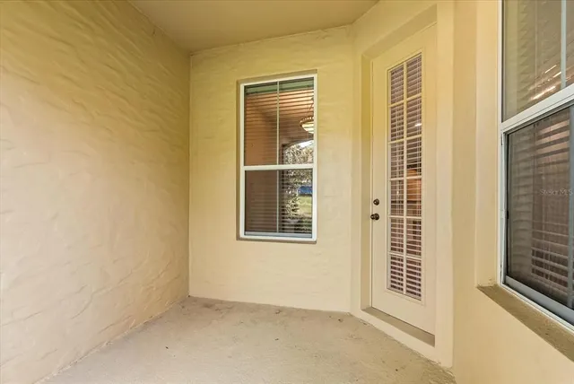 a swimming pool with outdoor seating yard and barbeque oven