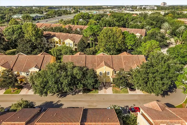 a view of a house with a tree