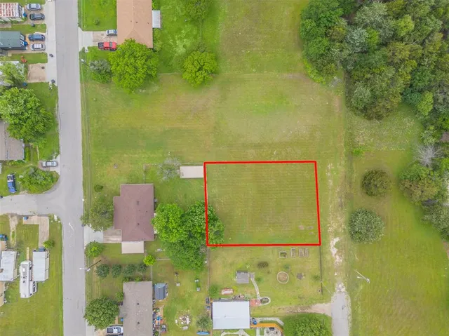 an aerial view of a residential apartment building with swimming pool