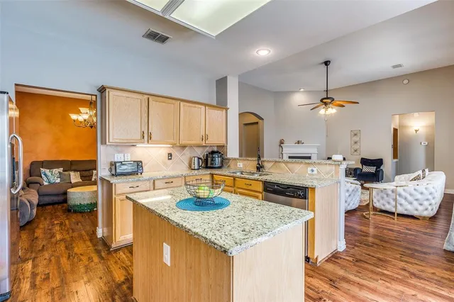 a fire hydrant in the middle of a field