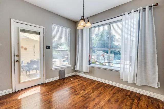 a view of a room with a large window