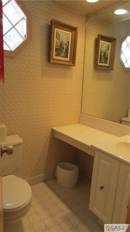 2407 Timber Oaks Road, Unit 2407 Edison, NJ 08820 - Photo 5 of 12 a bathroom with a toilet and a sink