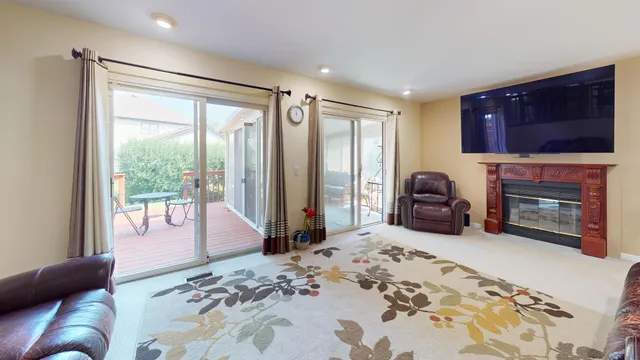 a bedroom with a bed couch and a window