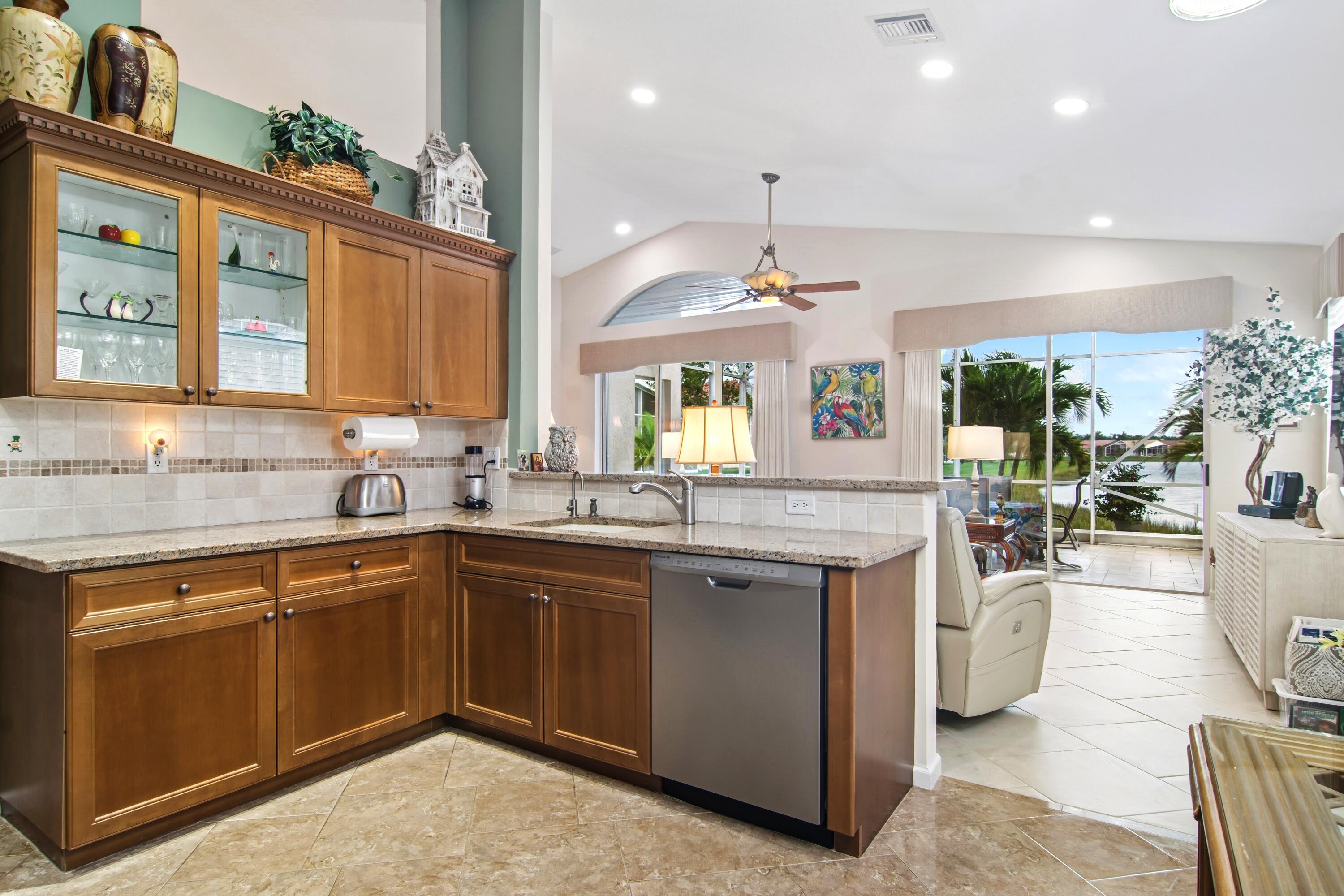 368 Springview Loop Port St. Lucie, FL 34986 - Photo 10 of 44 Kitchen to Living Room