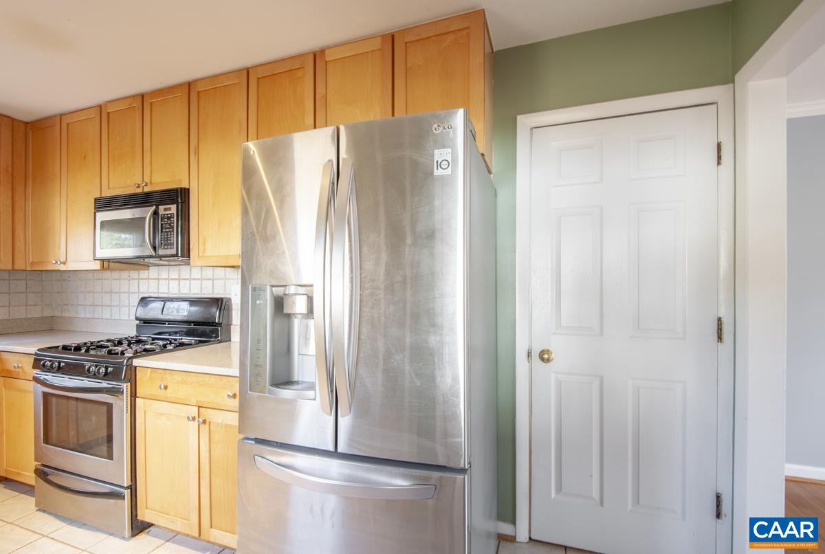2600 Willard Drive Charlottesville, VA 22903 - Photo 9 of 47 a kitchen with stainless steel appliances granite countertop a refrigerator and a stove top oven