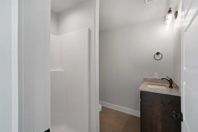 a view of an empty walk in closet