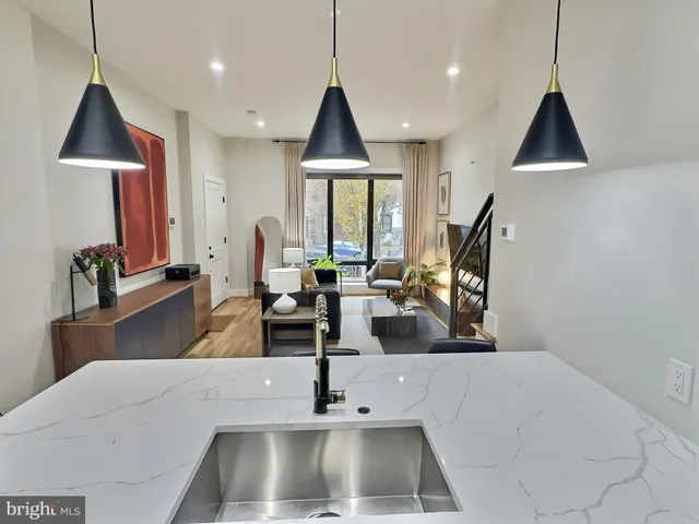 a view of living room with furniture and window