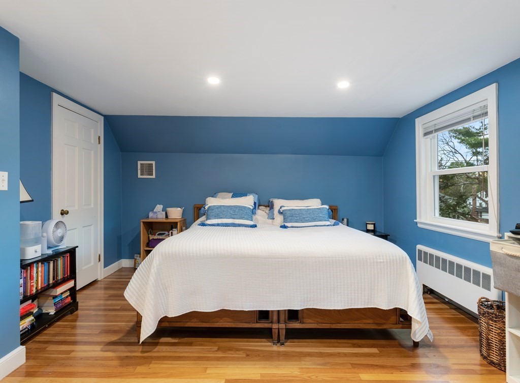 65 Charles River Street Needham, MA 02492 - Photo 14 of 21 a bedroom with a large bed and a window