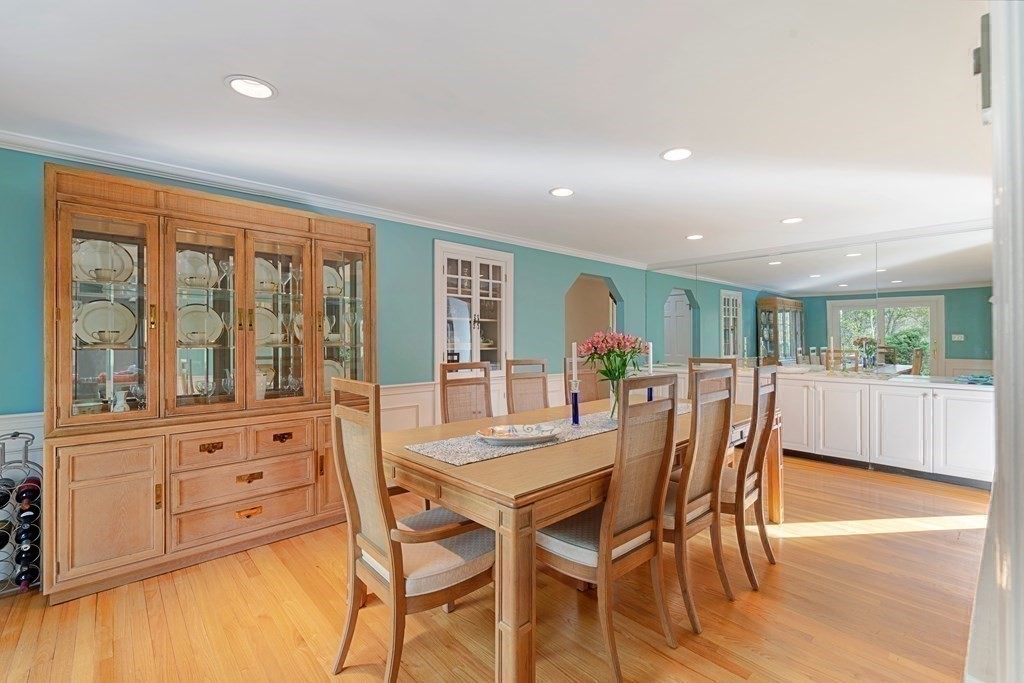 65 Charles River Street Needham, MA 02492 - Photo 18 of 21 a view of a dining room with furniture window and wooden floor