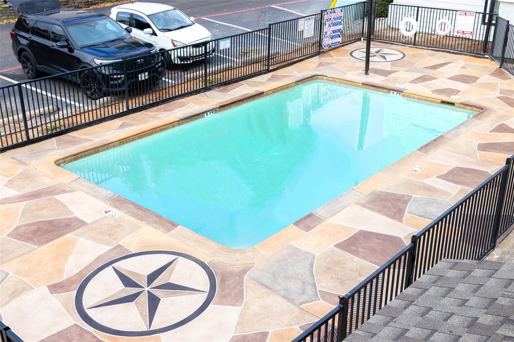 13266 Emily Road Dallas, TX 75240 - Photo 2 of 8 a view of swimming pool with a lounge chair