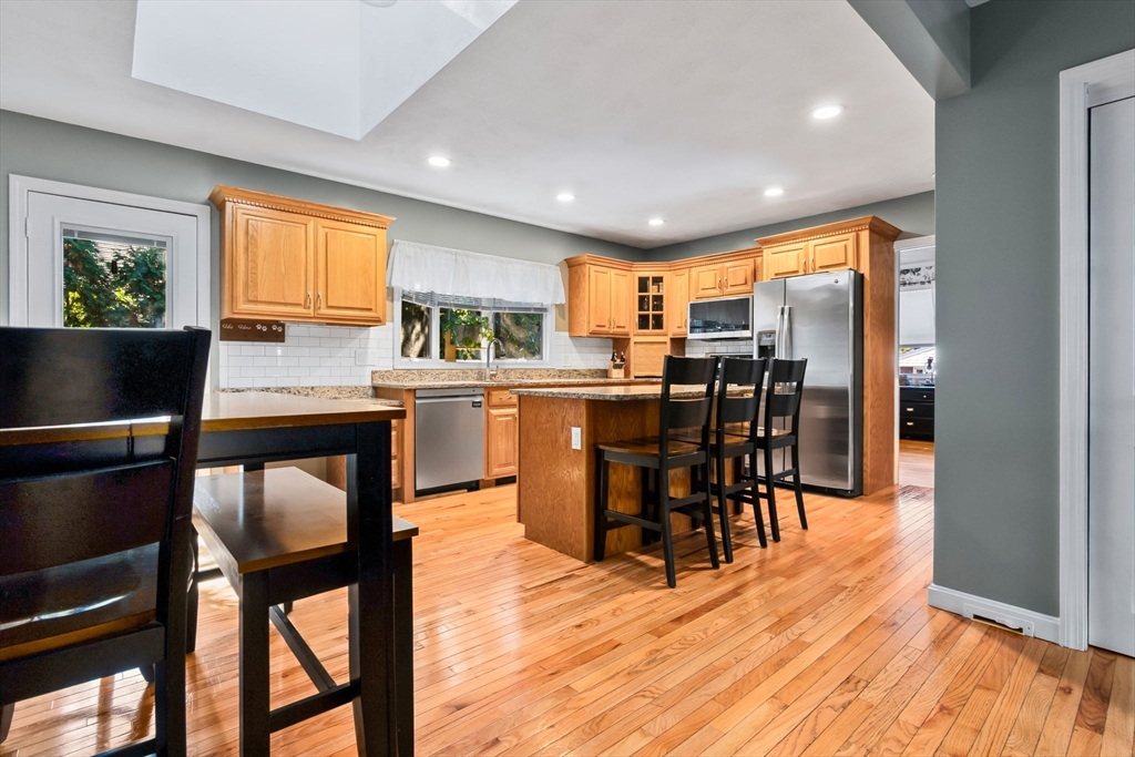 64 Vine Street Saugus, MA 01906 - Photo 2 of 42 a view of a dining room with furniture window and wooden floor