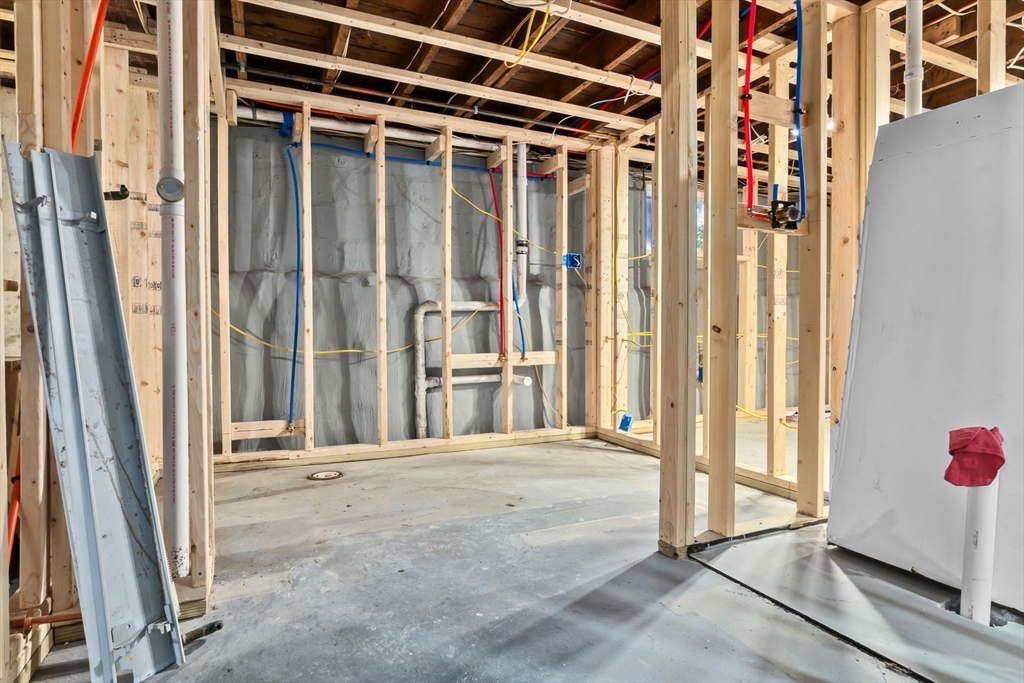 64 Vine Street Saugus, MA 01906 - Photo 29 of 42 a view of an empty room with a fireplace