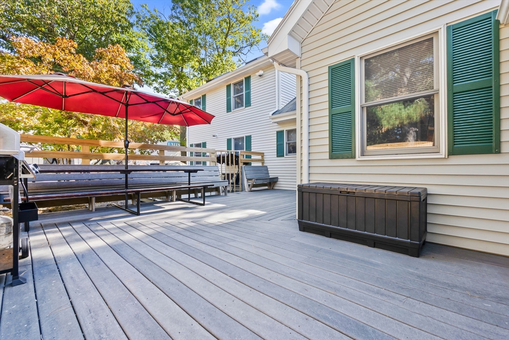 64 Vine Street Saugus, MA 01906 - Photo 35 of 42 a view of a rooftop deck with couch and chairs