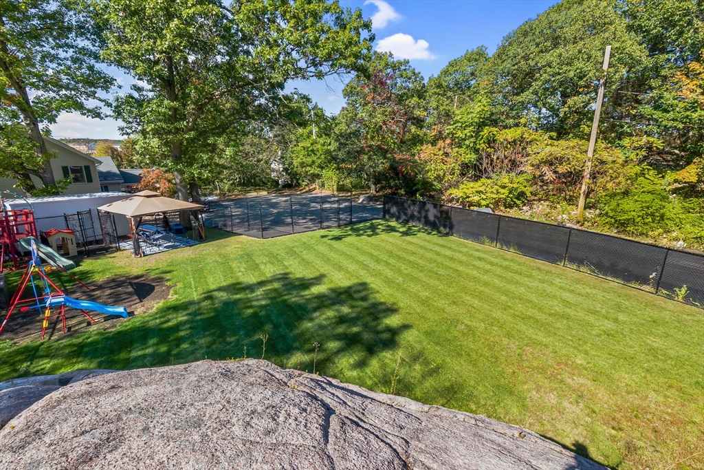 64 Vine Street Saugus, MA 01906 - Photo 38 of 42 a view of swimming pool with a patio