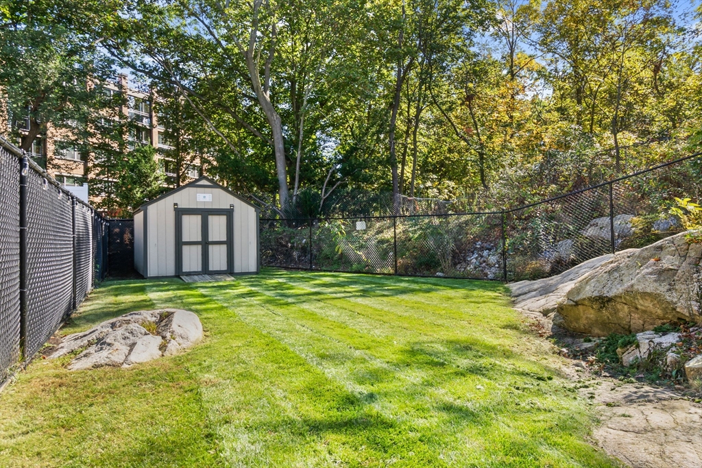 64 Vine Street Saugus, MA 01906 - Photo 39 of 42 a backyard of a house