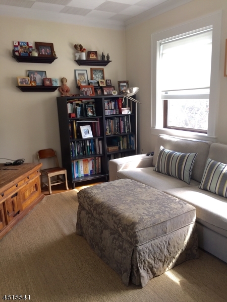 12 Orchard Road, Unit 2 Maplewood, NJ 07040 - Photo 5 of 11 a bed room with a bed and a window