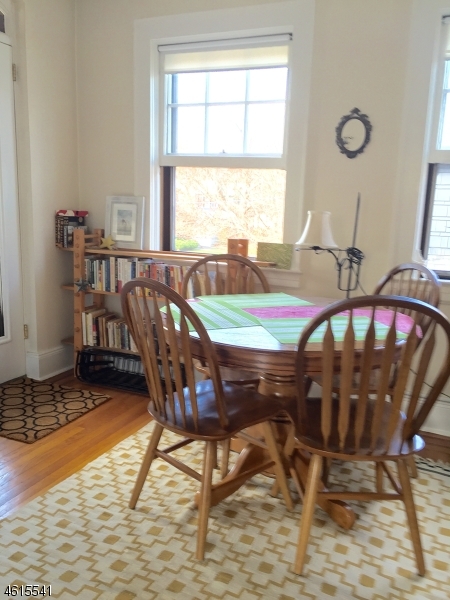 12 Orchard Road, Unit 2 Maplewood, NJ 07040 - Photo 7 of 11 a view of a dining room with furniture and a window