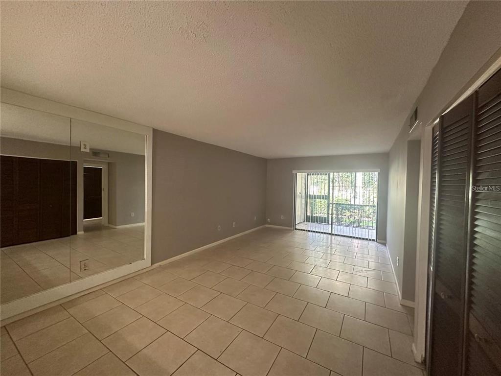 600 Cranes Way, Unit 103 Altamonte Springs, FL 32701 - Photo 3 of 17 a view of an empty room and window