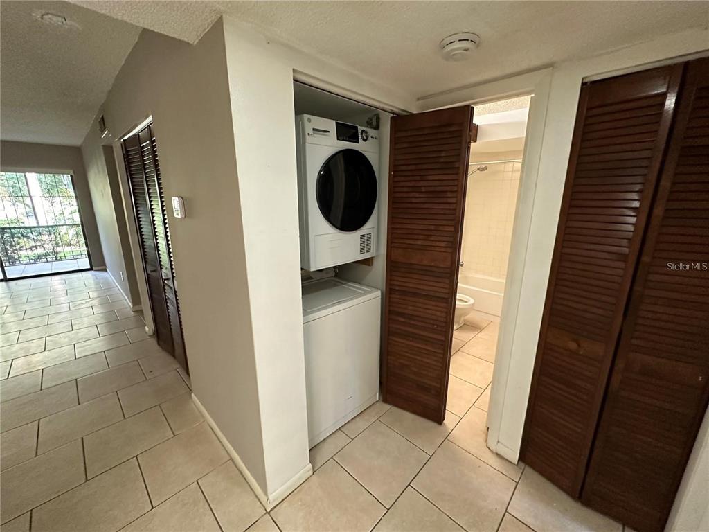 600 Cranes Way, Unit 103 Altamonte Springs, FL 32701 - Photo 6 of 17 a bathroom with a granite countertop shower and a sink