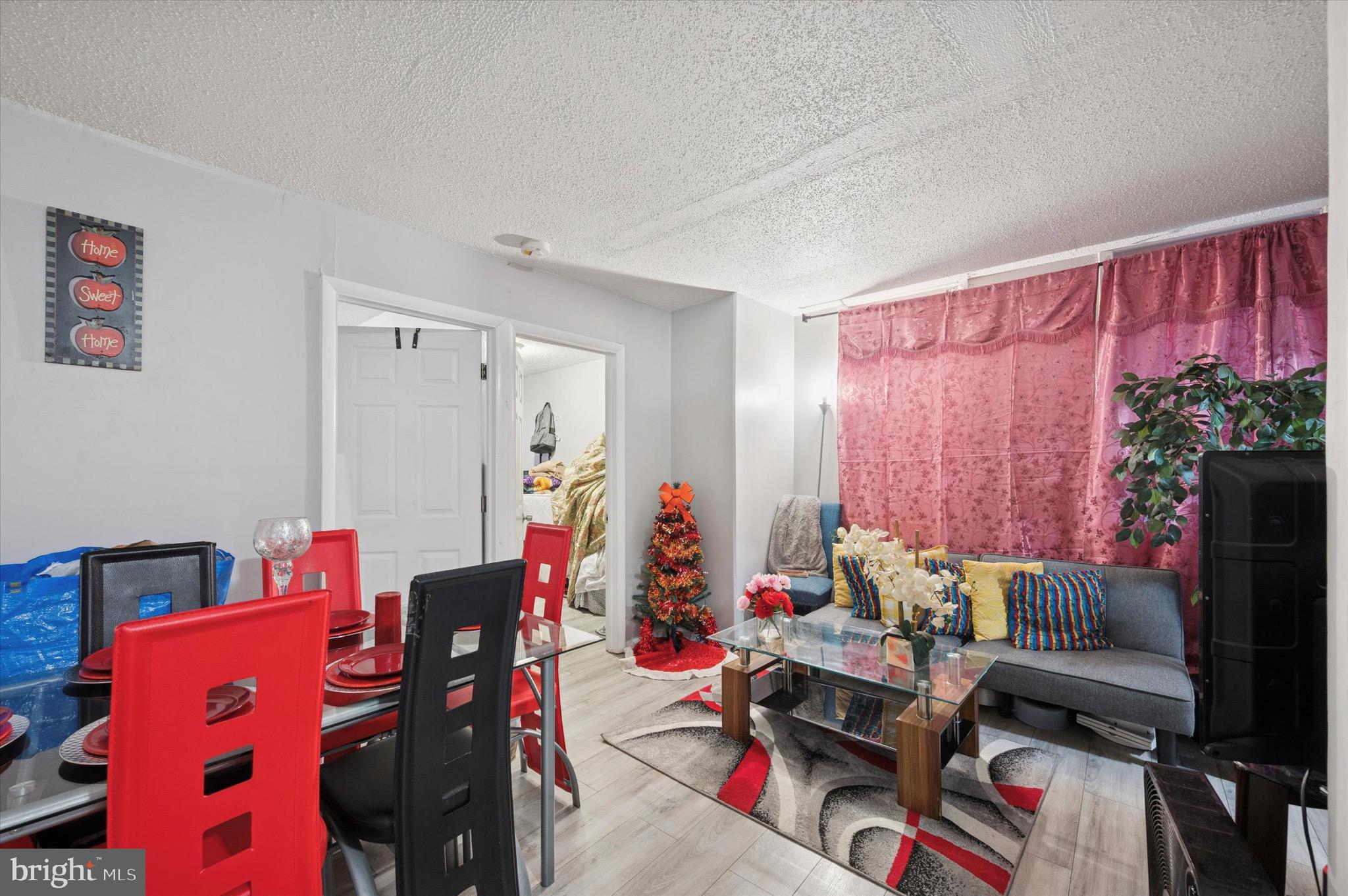 425 Main Street Darby, PA 19023 - Photo 6 of 18 a living room with furniture and a fireplace