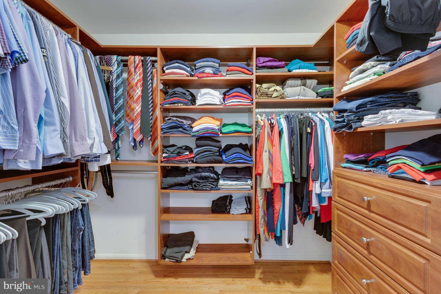 1524 Laurel Hill Road Vienna, VA 22182 - Photo 12 of 29 a view of walk in closet with clothes and shoes