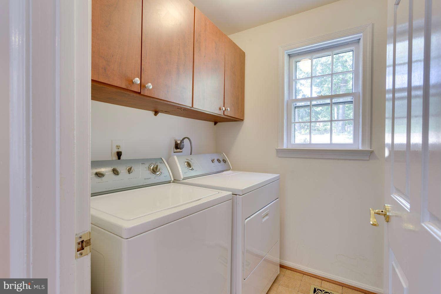 1524 Laurel Hill Road Vienna, VA 22182 - Photo 20 of 29 a utility room with dryer and washer