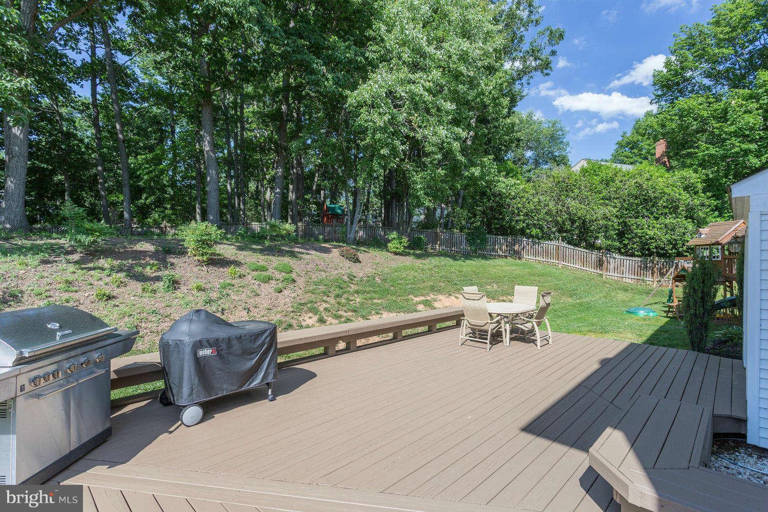 1524 Laurel Hill Road Vienna, VA 22182 - Photo 26 of 29 a view of a table and chairs in the patio