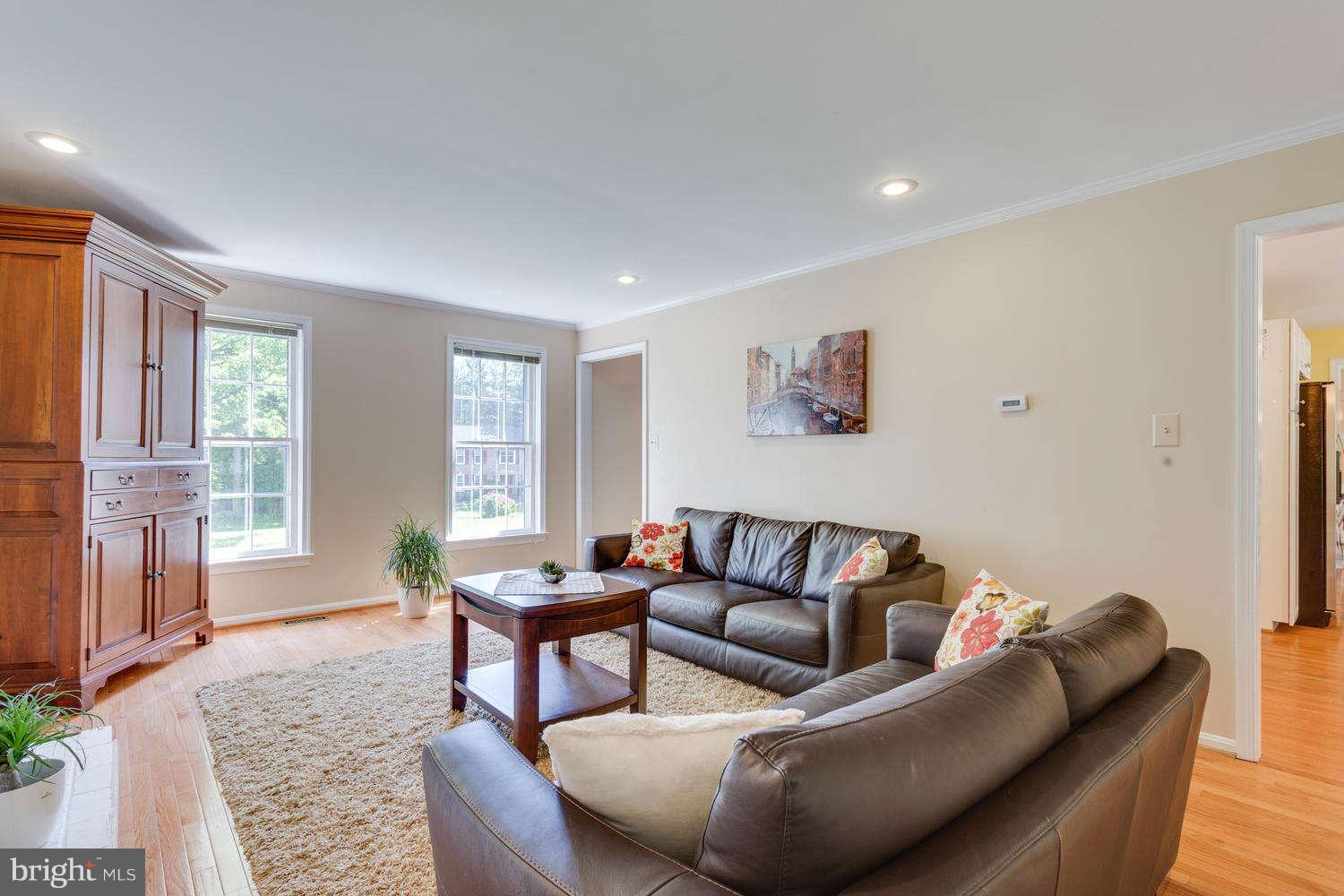 1524 Laurel Hill Road Vienna, VA 22182 - Photo 8 of 29 a living room with furniture and a large window