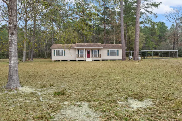 a house with trees in front of it