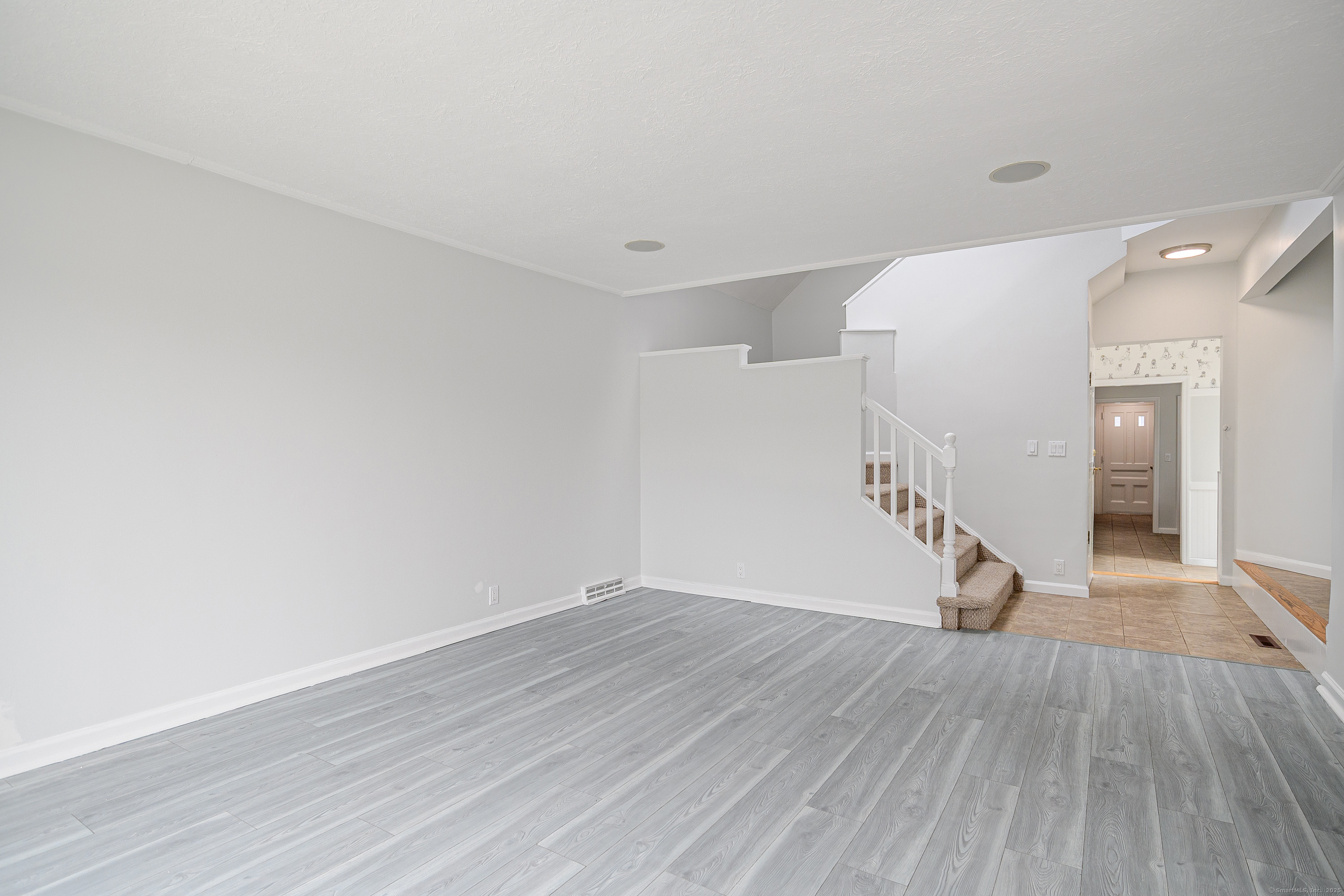 316 Reef Road Fairfield, CT 06824 - Photo 11 of 33 a view of entryway with wooden floor