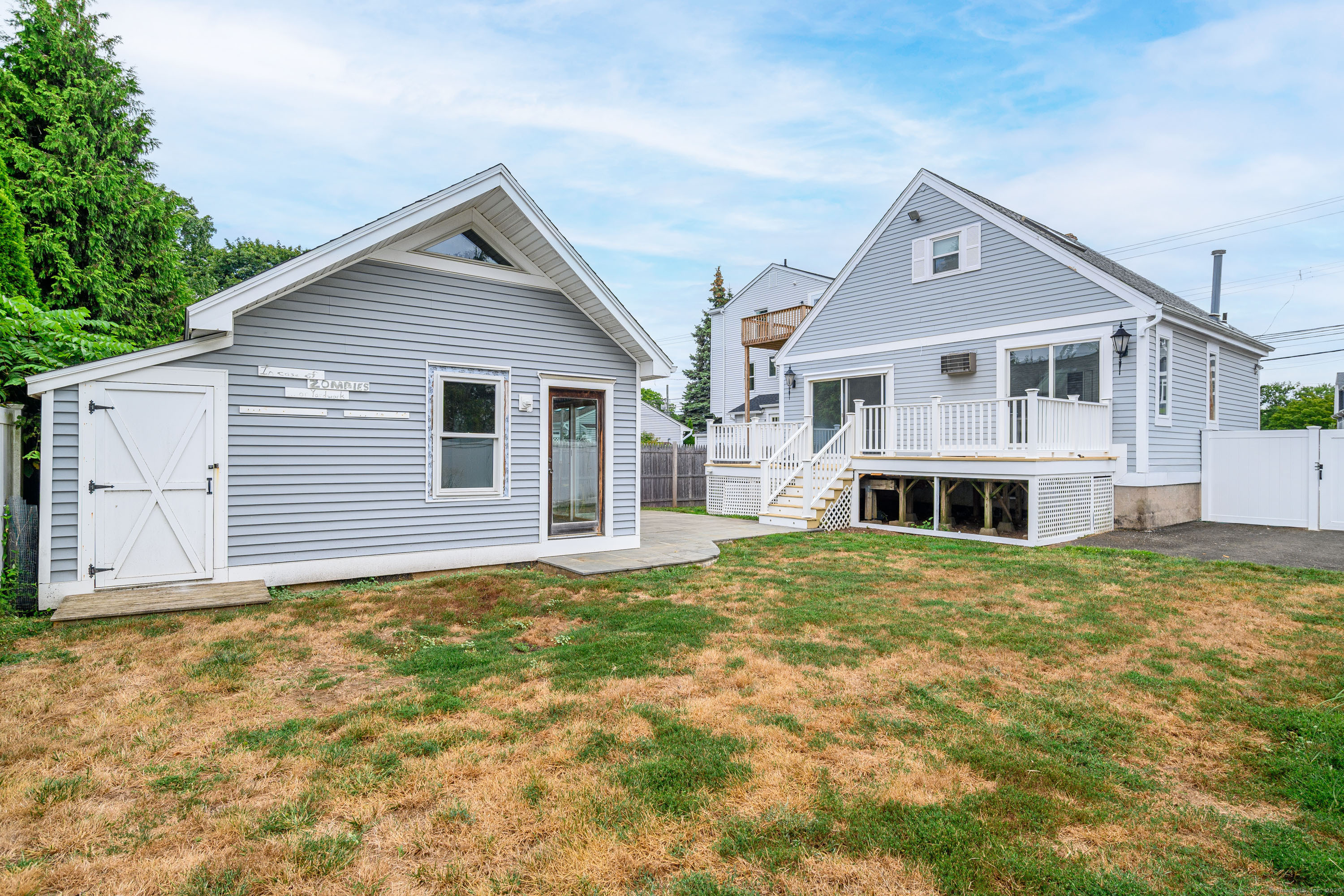 316 Reef Road Fairfield, CT 06824 - Photo 33 of 33 a front view of a house with a yard