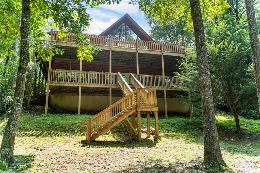 832 Adair Drive Ranger, GA 30734 - Photo 8 of 13 a view of a house with backyard