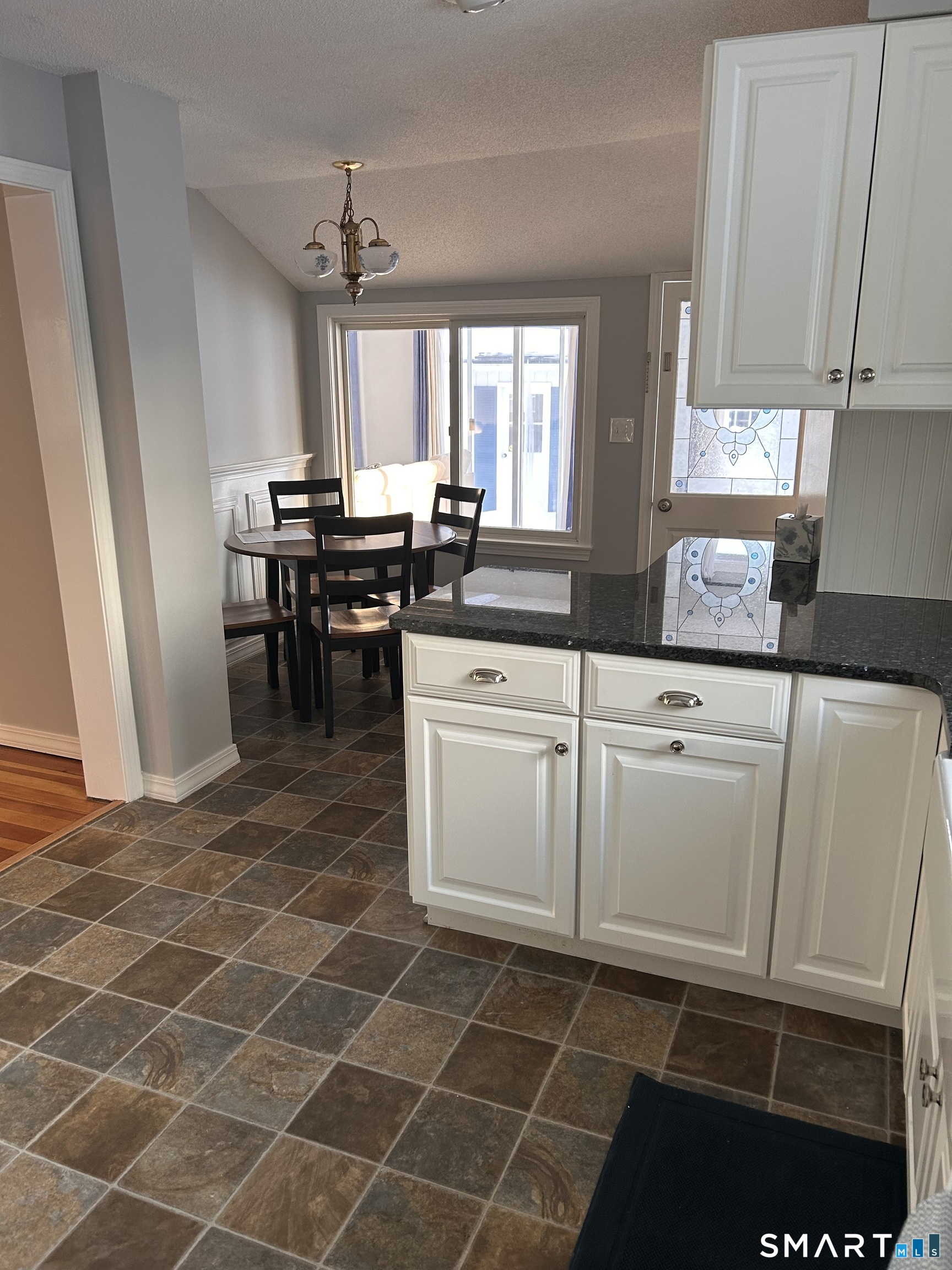 22 Indianola Road East Lyme, CT 06357 - Photo 12 of 18 a kitchen with a sink and cabinets