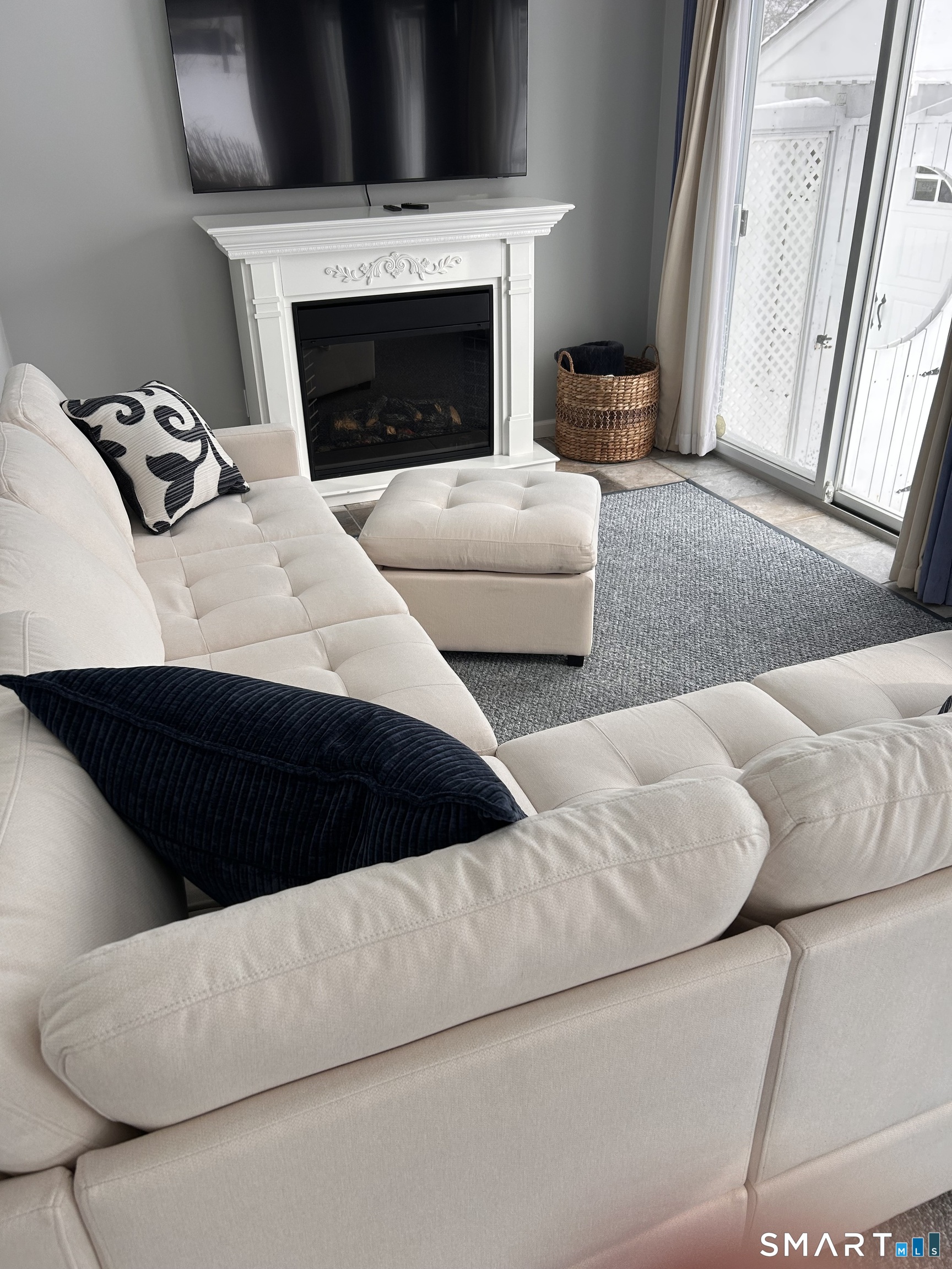 22 Indianola Road East Lyme, CT 06357 - Photo 14 of 18 a living room with furniture and a fireplace