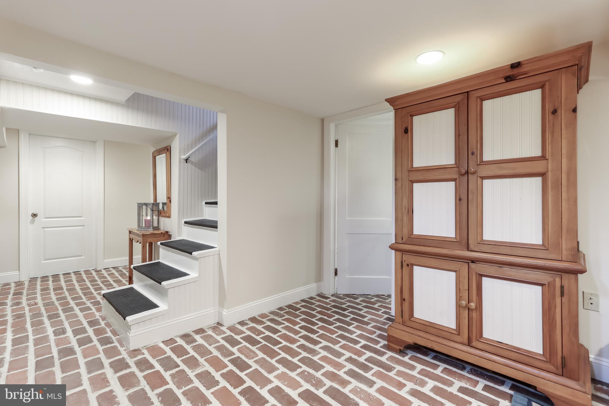 1442 Fairmount Road Hampstead, MD 21074 - Photo 33 of 45 Finished Basement with Brick Flooring