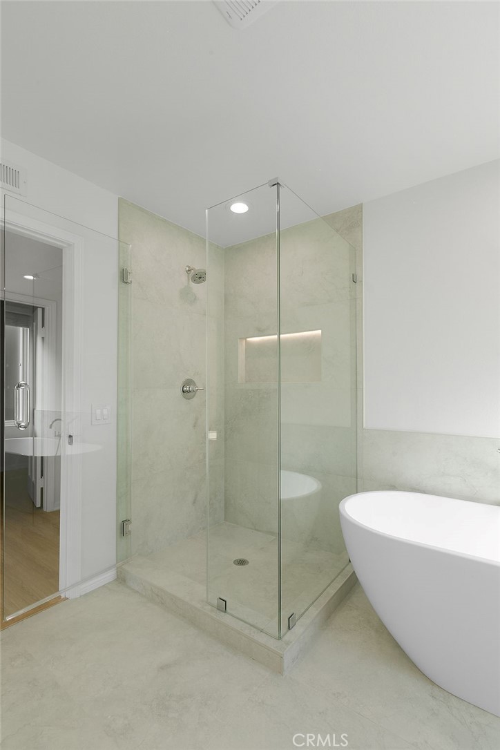 29950 Rolling Ridge Drive Agoura Hills, CA 91301 - Photo 18 of 26 a bathroom with a bathtub and a shower